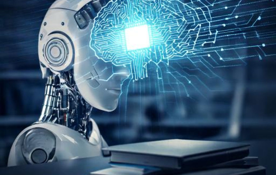 a robot standing in front of a stack of books with a drawing of a brain as a schematic diagram