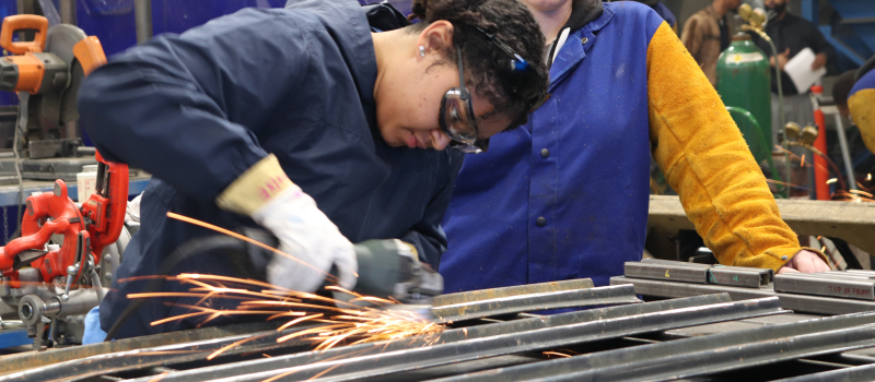 Students welding.