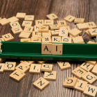 Scrabble tiles spelling out the word AI